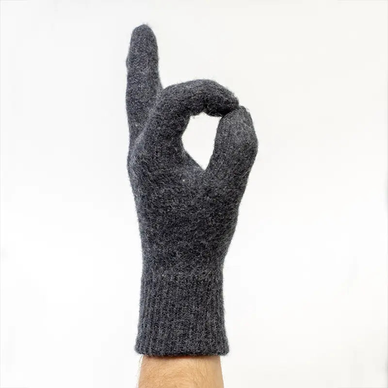 Enluva Wool Unterziehandschuh, angezogen OK Zeichen